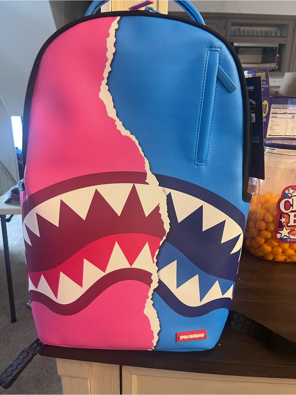 Sprayground Pink and Blue Split Shark Backpack